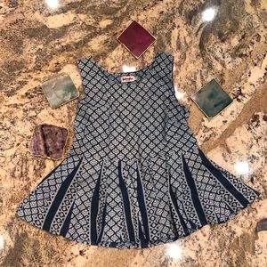 Blue patterned tank top flared at bottom